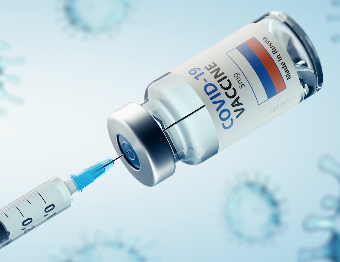 woman getting vaccine shot