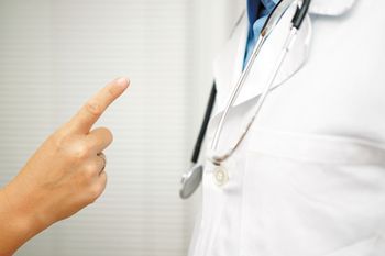veterinary-patient-is-angry-on-doctor-because-of-medical-error-312915209_450.jpg