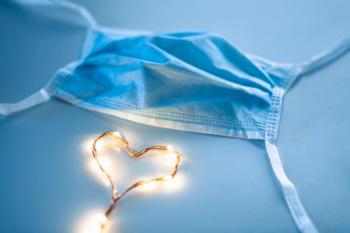 mask and lit up heart