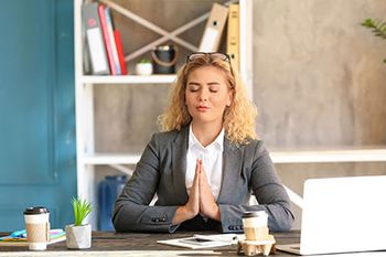 veterinary-woman-meditate-calm-zen-laptop-AdobeStock-237159087-450px.jpg