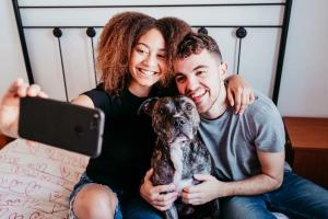 young couple with dog