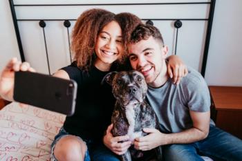 young couple with dog