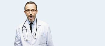 veterinary-doctor-senior-man-medical-professional-scared-in-shock-expressing-panic-450px-shutterstock-1077126053.jpg