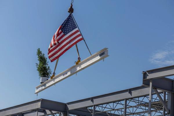 Placing the final beam at a new veterinary college in Arkansas