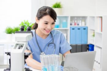 female veterinarian working on computer