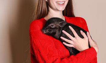 veterinary-woman-with-minipig.jpg