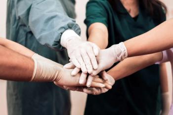 Doctors in group huddle