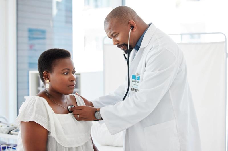 Doctor checking the heart beat of a patient with type 2 diabetes inside of an exam room. | Credit: Adobe Stock/By Nina/peopleimages.com