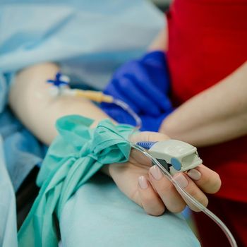 Person lying on hospital bed | Image Credit: Olga Kononenko/Unsplash