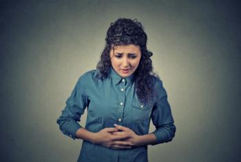 Woman with IBD experiencing gastrointestinal distress. | Credit: Fotolia