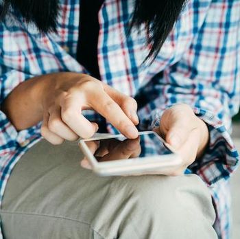 Person Using Smartphone | Credit: Pexels