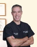 Stefan Weiss, MD, a dermatologist at Trillium Clinic and adjunct professor of dermatology at Brown University School of Medicine