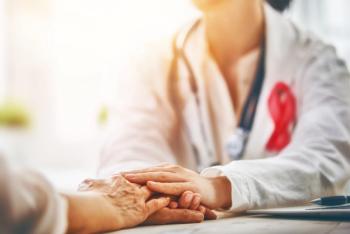 Health care provider consoling a patient