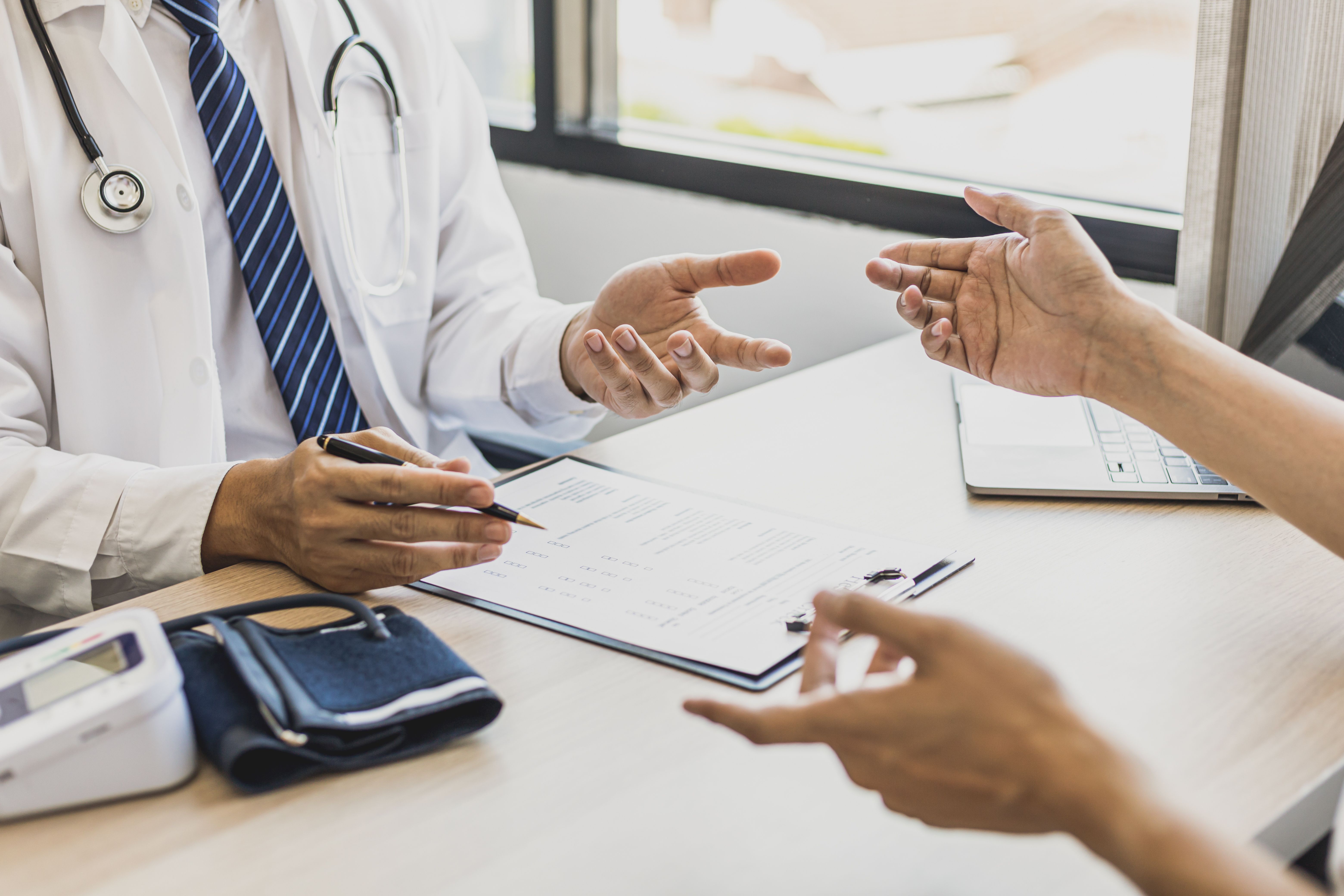Person having conversation with healthcare provider. | Credit: Adobe Stock
