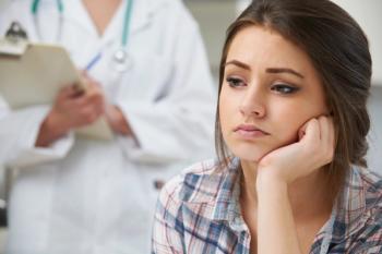 A young woman at the doctor.