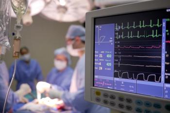 A team of clinicians implanting an ICD into a patient.