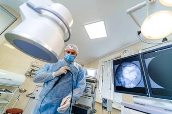 Stock imagery depicting doctor holding a probe preparing to perform colonoscopy | Credit: Adobe Stock