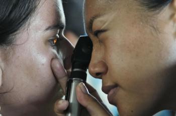 PCP performing a fundoscopy