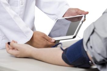 Woman checking blood pressure