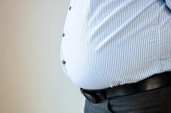 Stock image of person with obesity. | Credit: Adobe Stock