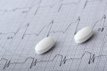 A close up of statins on top of an echocardiogram.
