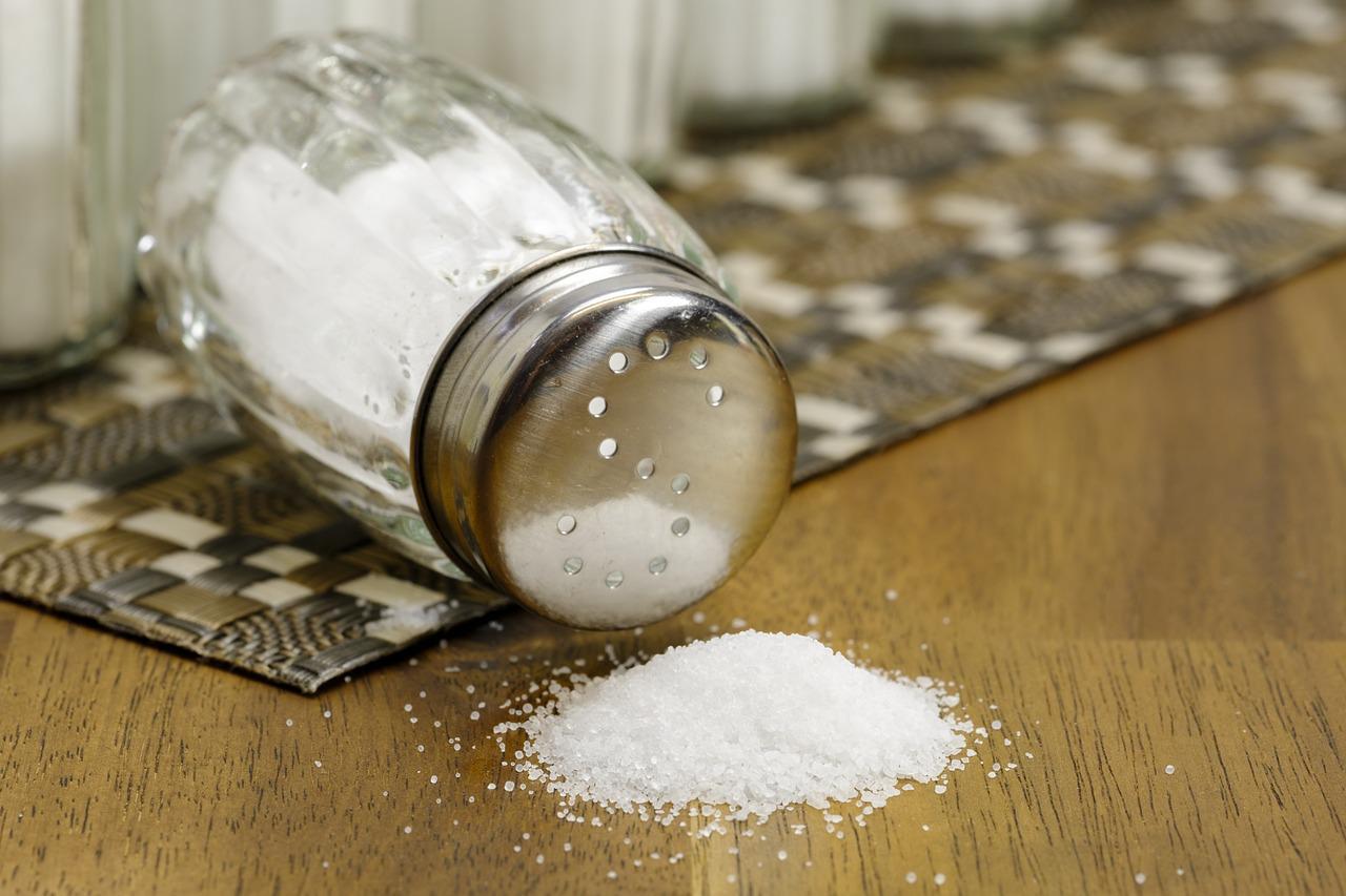 Salt shaker on a kitchen table.