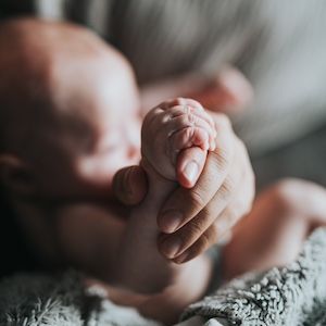Baby holding hand | Image Credit: Nathan Dumlao/Unsplash
