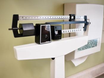 Close-up of numbers on a scale in a doctor's office.