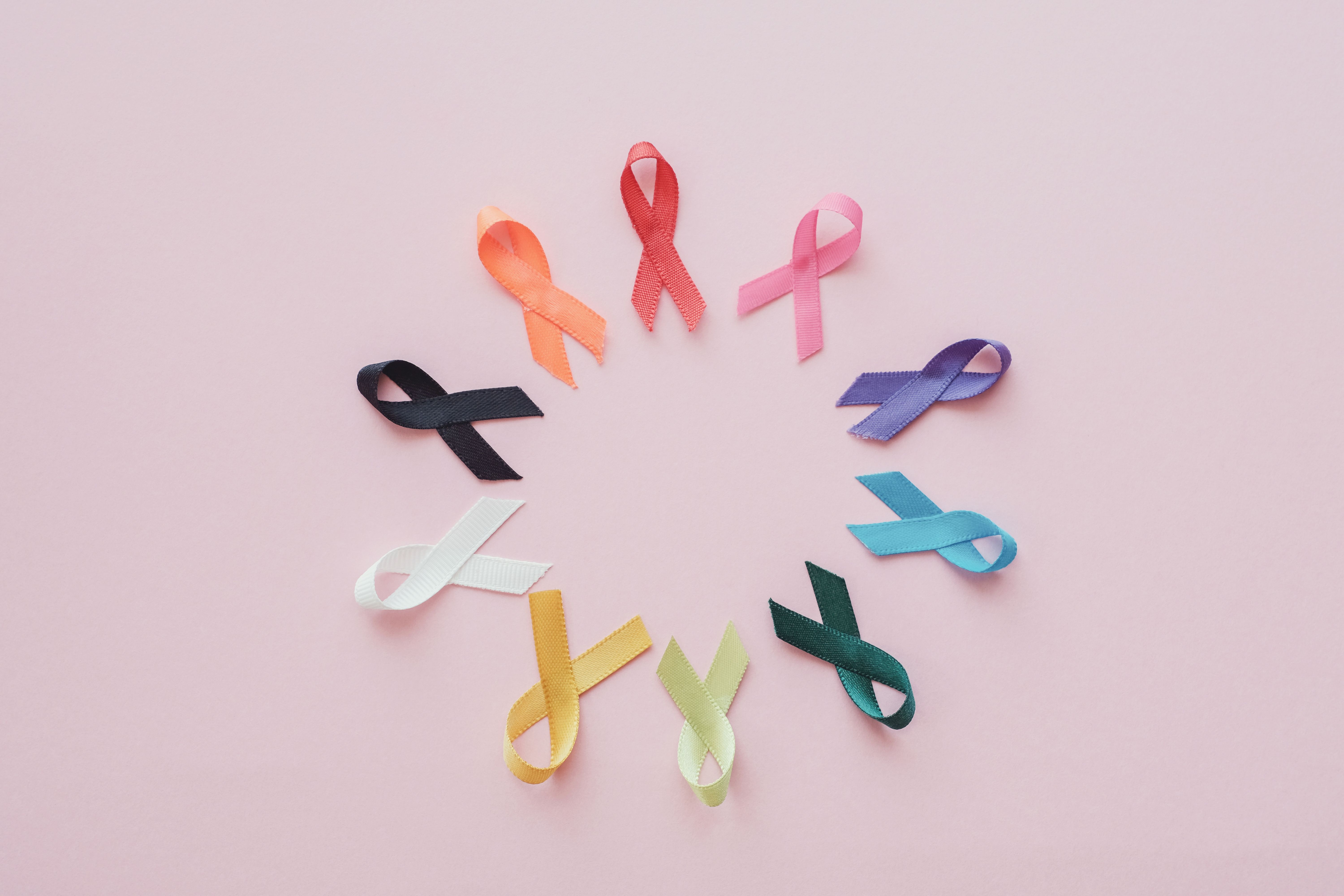 Generic photo of cancer ribbons placed in a circular formation. | Credit: Adobe Stock