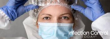 Health care worker in PPE suit (Adobe Stock 420074793 by scaliger)