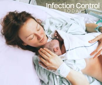 Mother holding her newborn after labor in a hospital.   (Adobe Stock 138706505 by nataliaderiabina)