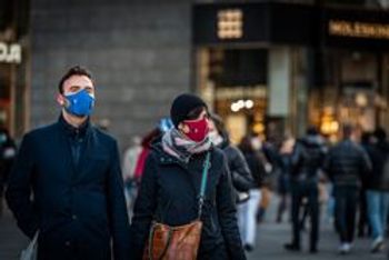 Masking to prevent the spread of COVID-19.