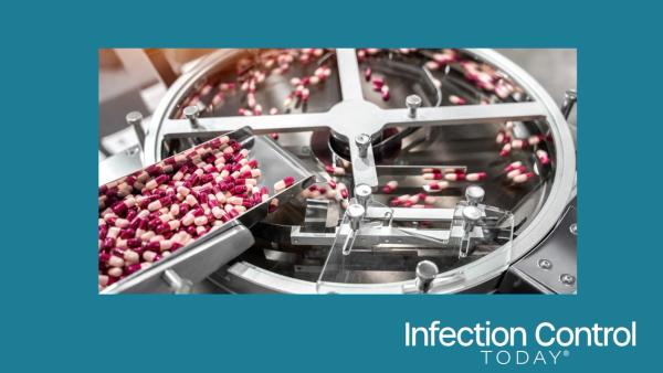 Pink and white capsules pills in the pills packaging machine, pharmacy medicine capsule pill in production line at medical factory.  (Adobe Stock 1607190690 by funfunphoto)