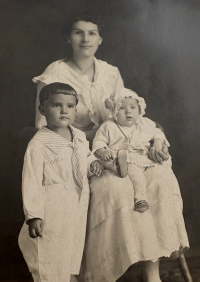 Author’s grandmother with 2 of her children before they were taken by measles. (Image reprinted with permission from the author)