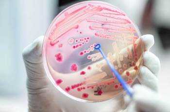 Pathogens on a microscope slide.  (analysis121980 - stock.adobe.com)