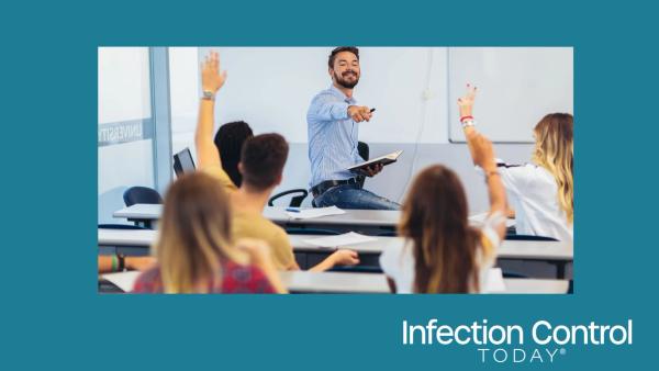 A group of students raising their hands in class during a lecture  (Adobe Stock 292282454 by Mediteraneo