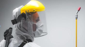 Environmental service worker in full prevention gear