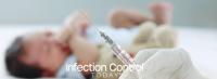 A doctor's hand wearing a medical glove holds a syringe against a blurred background of a small, crying newborn infant lying down during vaccination. (Adobe Stock 476226620 by Stella)