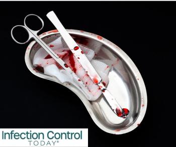 After surgery, bloody medical instruments with a scalpel, cotton swab, surgical scissors, and latex gloves covered in blood in a kidney bowl isolated on a black background. (Adobe Stock 263186236 by Victor Moussa)