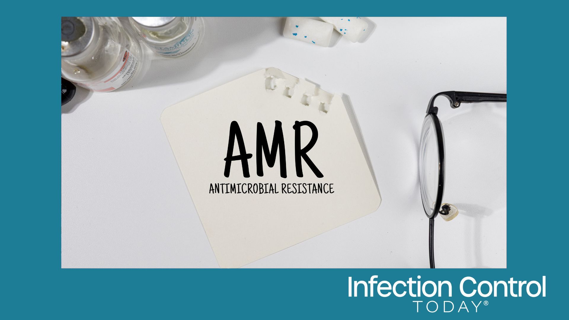 A Note with “Antimicrobial Resistance (AMR)” on the doctor's desk   (Adobe Stock 1564334289 by Kamitana)