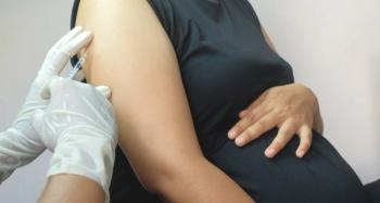 A pregnant woman (Adobe Stock, anon)