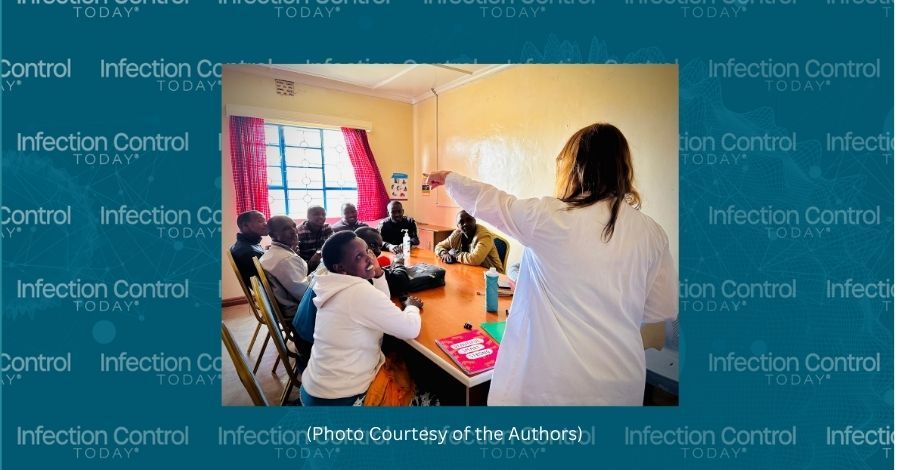 Saunders educating community health promoters on the chain of infection in Village 1. (Photo courtesy of the authors) 