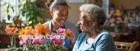 A long-term care facility's nurse ministering to an elderly woman. (Adobe Stock 690038114 by tongpatong)