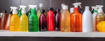 Disinfectant bottles on shelf (Adobe Stock 605352002 by primopiano)
