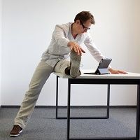 Stretching at desk