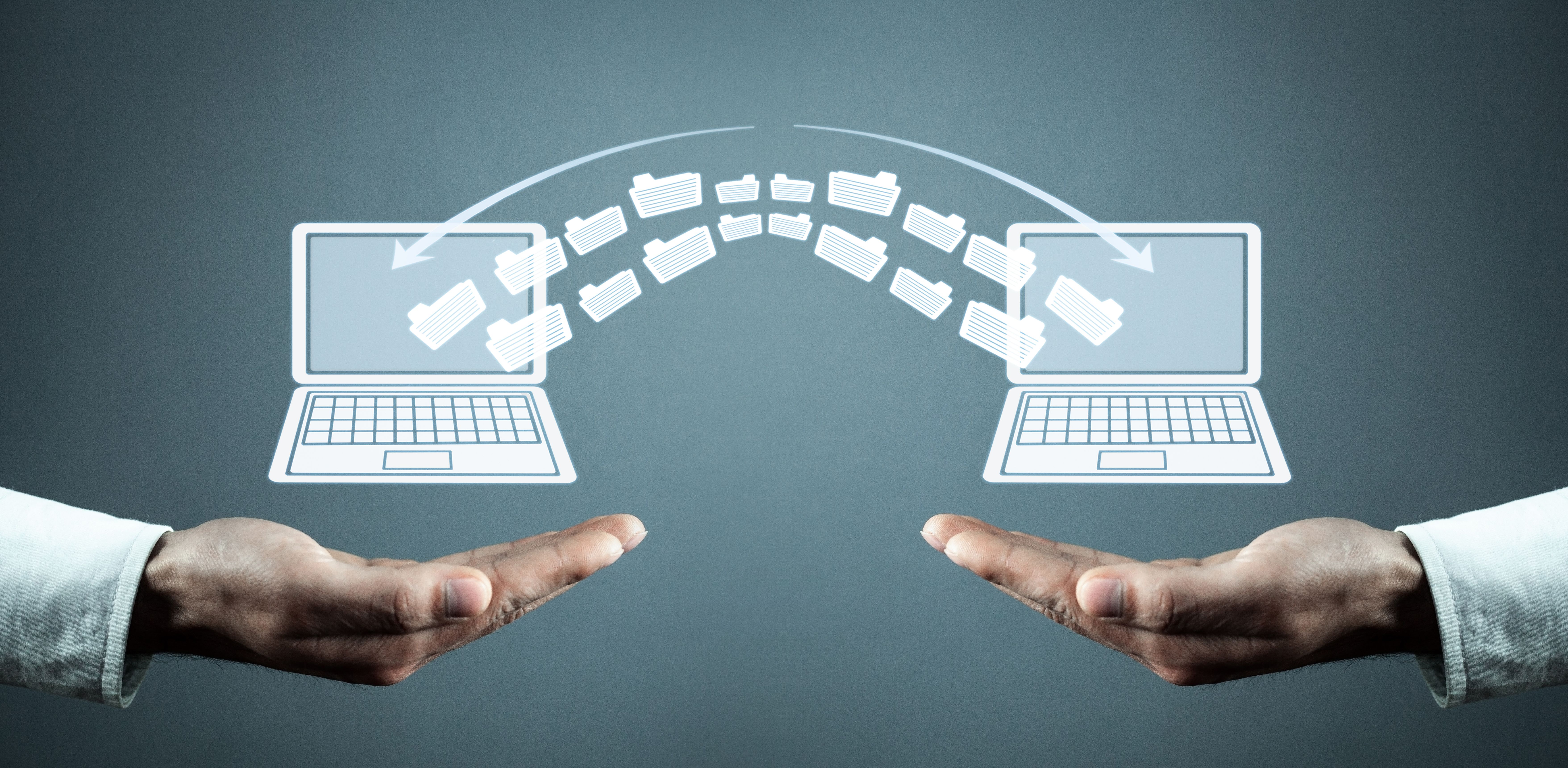 Image of information exchange between laptops ©andranik123-stock.adobe.com