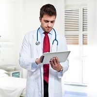 doctor with ipad
