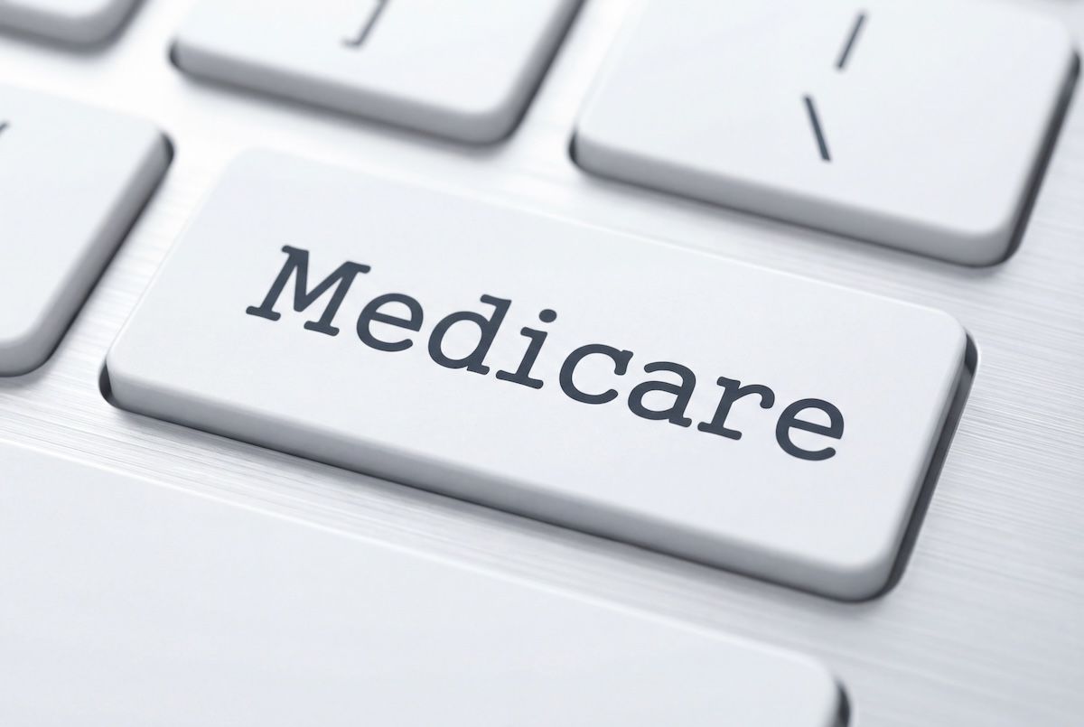 Medicare key on white keyboard © Hiskia - stock.adobe.com