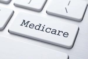 Medicare key on white keyboard © Hiskia - stock.adobe.com 