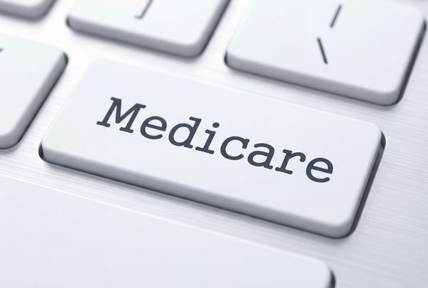 Medicare key on white keyboard © Hiskia - stock.adobe.com 